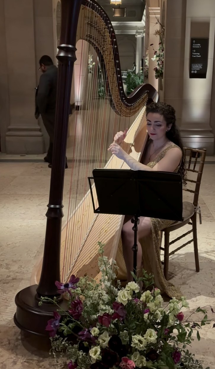 Christa Dalmazio playing the harp